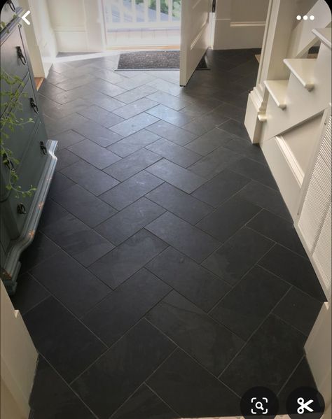 Herringbone Tile Entry, Gray Hexagon Tile Floor Mudroom, Charcoal Floor Kitchen, Dark Tiled Kitchen Floors, Black Floor Tile Laundry Room, Black Herringbone Tile Floor Entryway, Mudroom Entryway Flooring, Black Herringbone Tile Floor Kitchen, Laundry Room Black Tile Floor