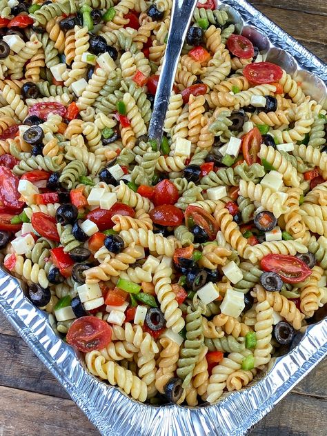 Tri colored rotini pasta salad with cherry tomatoes, olives, cheese, bell peppers and Italian dressing Try Color Pasta Salad, Easy Pasta Party Dishes, Pasta Salad Recipes Tri Color, Tri Color Rotini Pasta Salad, Box Pasta Salad Add Ins, Boxed Pasta Salad Add Ins, Tri Pasta Salad, Pasta Salad With Rotini Noodles, Pasta Salad Rotini