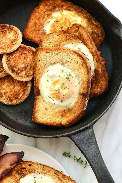 Eggs in a Basket (AKA Egg in a Hole) is such a fun twist on breakfast. Crack your egg right into a piece of toast for an open-face breakfast sandwich! Ways To Eat Eggs, Framed Recipes, Eggs And Toast, Detoxifying Food, Egg In A Hole, Eggs In A Basket, Fit Foodie Finds, Eggs For Breakfast, Oatmeal Cups