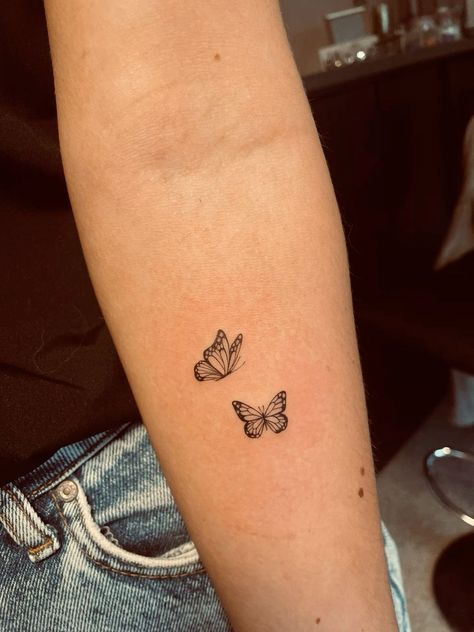 Butterfly tattoo - Tiny tattoo Check more at https://ideatatto.com/small/butterfly-tattoo-tiny-tattoo/ Fine Line Tattoos For Women Butterfly, Unique Small Butterfly Tattoo, Cute Matching Tattoos With Mom, Butterfly On Forearm, Small Tattoos Butterflies, Tony Butterfly Tattoo, November Butterfly Tattoo, Butterfly Tattoo Sisters, Butterfly And Bumble Bee Tattoo