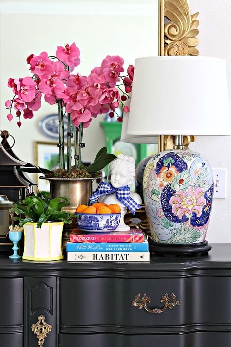 Chinoiserie Chic Living Room, Modern Chinoiserie Living Room, Faux Orchid Arrangements, Orchid Interior, Chinoiserie Interior, Dimples And Tangles, Faux Orchid, Black Dresser, Chinoiserie Decorating