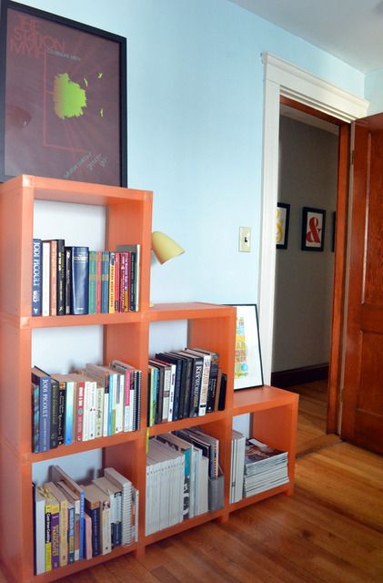 digging the orange bookshelves... Orange Bookshelf, Orange Bookshelves, Blue Bookshelves, Cool Shelves, Adjustable Shelf, House Tour, My Bedroom, Apartment Therapy, Dream Room