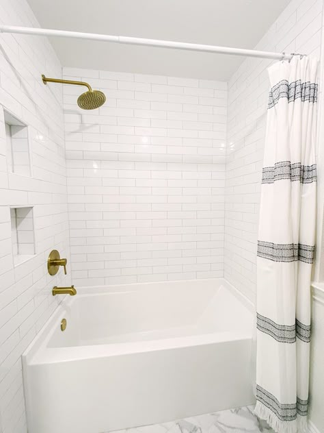 White Subway Tile Tub Shower Combo, Bathtub White Subway Tile, Artisan Frost Ceramic Tile Bathroom, Bath Shower Combo Tile Ideas, 4x12 Subway Tile Bathroom Showers, Simple Bathroom Remodel With Tub Shower Combo, White Subway Tile Bathtub, Subway Tile Bathroom Tub, Bathtub Shower Combo Tile