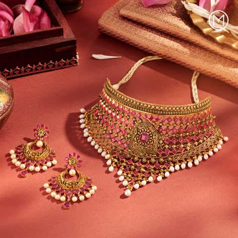 On her special day, she is truly the cynosure of all eyes. And her jewellery, adorned with pink gems and white pearls, add an enchanting touch to her stunning bridal ensemble. #BridesOfIndia #MalabarGoldAndDiamonds #ShowTheWay #IndianBrides #BridalJewellery #GemstoneJewellery #Precia Maharaja Jewellery, Bride Ornaments, Royal Bridal Look, Jewellery Moodboard, 22 Karat Gold Jewelry, Jewellery Shoot, Photographing Jewelry, Wedding Jewelry Sets Bridal Jewellery, Jewellery Photography Inspiration