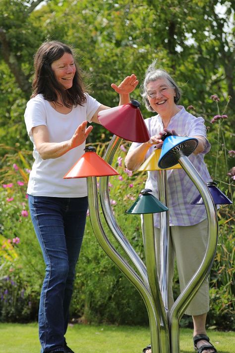 Reminiscent of the small grassland mushrooms, our Liberty Bells allow players to experience something magical and bring a little enchantment to the local music park or garden. Expertly crafted, the aluminum musical bells, tuned to the pentatonic c-major scale, 'sing' when the push button located on top of each 'cap' is pressed, activating the hidden striker beneath. The stainless-steel 'gill' on the underside of the cap neatly hides the mechanism. Outdoor Music Area Eyfs, Outdoor Music Stage, Outdoor Music Area, Musical Playground, Outdoor Musical Playground, Library Exterior, Sensory Playground, Outdoor Xylophone, Outdoor Musical Instruments