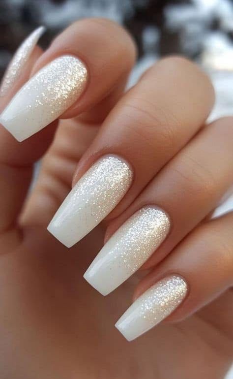 Simple Nail Art White Nails, White Nails Glitter Accent, White Glitter Nails With Designs, White Gold Glitter Nails, White Nails With Black Glitter, White Ombre Sparkle Nails, Sparkling White Nails, White Nails With White Glitter, White Sparkle Ombre Nails