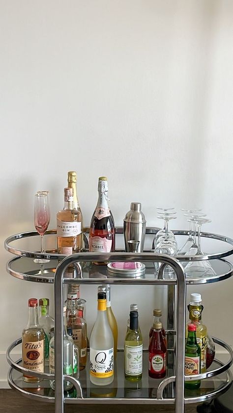 Drink Cart Aesthetic, Living Room Bar Ideas Apartments, Bar Cart In Living Room Ideas, House Bar Aesthetic, Aesthetic Bar Stools, Aesthetic Home Bar, Vintage Bar Cart Aesthetic, 70s Bar Cart, Cocktail Cart Ideas