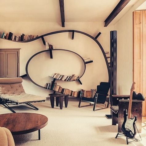 THE LONDON LIST on Instagram: “The eighteenth century home of gallerist François Laffanour, Brittany; Ron Arad’s snail-like steel ‘bookworm’ shelving (c. 1990), an…” Steel Bookcase, Prouve Chair, Ron Arad, Cool Bookshelves, Wall Corner, Osvaldo Borsani, Book Rack, Bookcase Design, Bookshelf Design