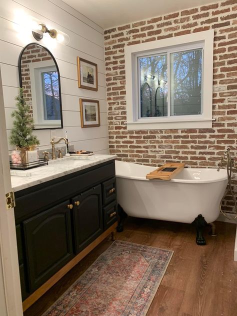 Brick And Shiplap Wall Bathroom, Shiplap And Brick Bathroom, White Wash Brick Bathroom, Brick Veneer Bathroom, Brick In Bathroom Accent Walls, Painted Brick Bathroom, Faux Brick Bathroom Wall, Brick Accent Wall Bathroom, Bathroom Focal Wall Ideas