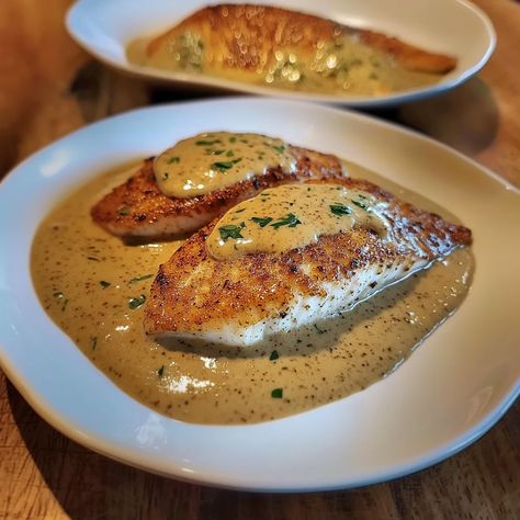 Red Snapper with Creamy Creole Sauce 🍽️🌶️🐟 (recipe below) Dive into the rich flavors of the South with this Red Snapper with Creamy Creole Sauce. The tender fillets are perfectly seared and topped with a luscious, spiced sauce that elevates this dish to a new level of deliciousness. Ingredients:For the Red Snapper:4 red snapper fillets Hog Snapper Recipe, Mutton Snapper Fish Recipes, Snapper Fillet Recipe Baked, Lane Snapper Recipes, Red Snapper Recipes Baked Ovens, Grilled Snapper Fish Recipes, Red Snapper With Creamy Creole Sauce, Mutton Snapper Recipe, Whole Snapper Fish Recipes