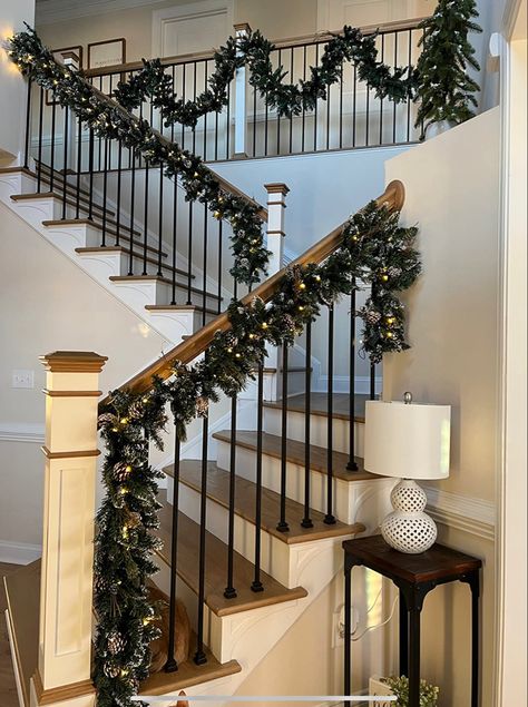 Christmas decor, christmas garland, aesthetic christmas, winter decor Christmas Garland On Railing, Christmas Decor Ideas For Stair Railings, Garland On Stair Railing, Railing Christmas Decorations, Stairway Garland Christmas, Railing Garland Christmas, Christmas Railing Decor Indoor, Christmas Decor For Mantle, Christmas Railing