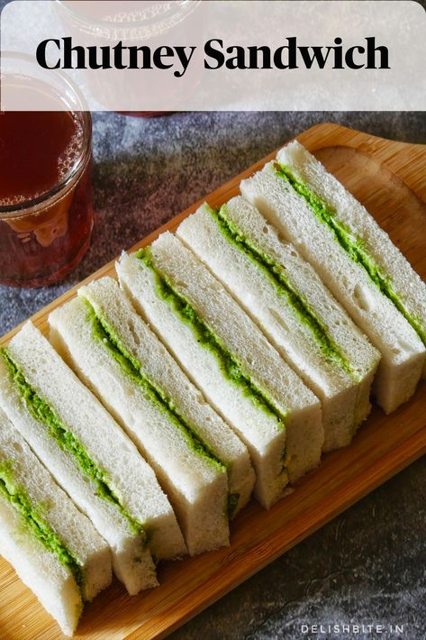 This pleasing Chutney Sandwich is one of the easiest one can ever make. You simply need bread, butter and green chutney to make these amazing sandwiches. The green chutney is super delicious and prepared with handful ingredients. It has nutty taste of coconut with slight spiciness and hint of sweet and tangy taste from sugar and tamarind respectively. Spread generous amount of butter and chutney on soft bread slices and club them together; its that simple !! Chutney Sandwich Indian, Green Chutney Sandwich, Green Chutney For Sandwich, Simple Sandwich Recipes, Sandwich Chutney Recipe, Rainbow Sandwich, Amazing Sandwiches, Bday Food, Bread Snacks Recipe