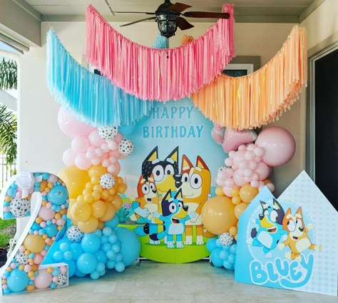 Whether you're still searching for unique birthday party themes, or have already decided that you're planning the *best ever* Bluey birthday party, this *freaking adorable* collection of Bluey party ideas will have you ridiculously excited and feeling totally inspired! From Bluey birthday cakes, cookies, food ideas, decor and so much more, these are the best Bluey birthday parties around! (One of the best toddler birthday themes for 2023). Bluey Themed Backdrop, Bluey Theme 1st Birthday, Bluey Birthday Garland, Blimey Birthday Party, Three Year Old Bluey Party, Bluey Birthday 2 Girl, Bluey Backdrop Birthday, Blues Birthday Theme Girl, Bluey Halloween Birthday