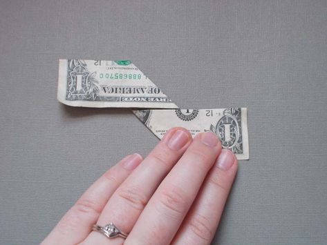 Make a Dollar Bill Origami Ninja Star Dollar Origami Step By Step, Dollar Star Origami, Dollar Bill Origami Easy Step By Step, Origami Dollar Bill Easy Step By Step, Origami With Dollar Bills, Ninja Throwing Star, Origami Money, Folding Money, Ninja Star