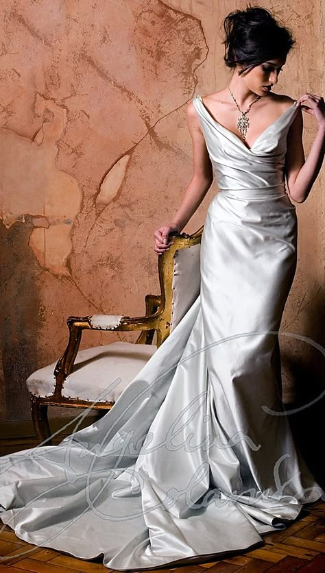 Dolce vita wedding dress, wedding dresses for mature brides, elegant and glamorous, outstanding corsetry, timeless design and signature 1950s body draping . Angelina’s dresses are sensuous, evocative and bespoke. Each gown capturing the very spirit of vintage silver screen and the timeless elegance of the world's most unforgettable women. mature bride, elegant wedding dress, elegant bride, timeless wedding dress, glamorous, dramatic, theatrical, bespoke bride, couture designer london, mature ... Angelina Colarusso, Vintage Style Wedding Dresses, Colored Wedding Dress, Bespoke Wedding Dress, Hollywood Wedding, Vintage Style Wedding, Wedding Dress Couture, Couture Wedding, Old Hollywood Glamour