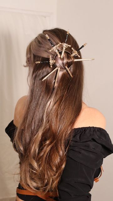 Maureen - Hairstyle on Instagram: "New hairstyle with swords ✨⚔️✨I was inspired by a rudder ! Do you like the result ? 🖤 #maureen #hairstyle #sword #badasshair #updohairstyles" Cute Pirate Hairstyles, Witch Aesthetic Hair, Pirate Inspired Hairstyles, Demon Hairstyles, Warrior Hairstyles, Wedding Swords, Hair Pin Hairstyles, Fantasy Hair Styles, Pirate Hairstyles