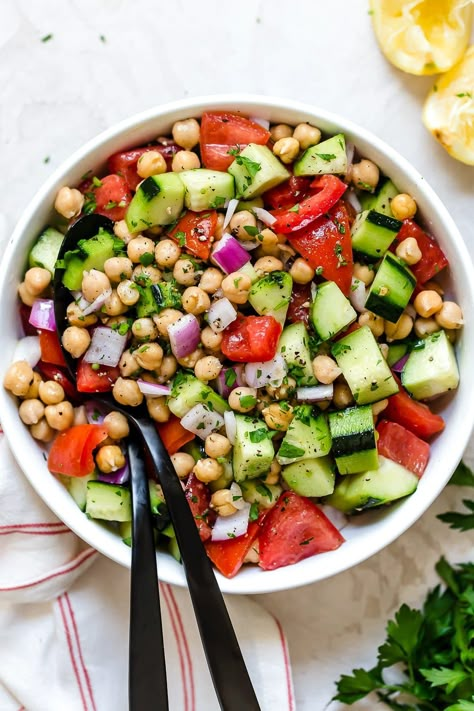 This healthy, summer Chickpea Salad with cucumbers and tomatoes is great for lunch or as a side dish with anything you're grilling! #chickpeas #salad #vegan #vegetarian #legumes #healthyrecipes #sidedish #lunch Salad With Cucumbers And Tomatoes, Healthy Chickpea Salad, Grape Tomato Recipes, Chickpea Salads, Chickpeas Salad, Macros Recipes, Cucumbers And Tomatoes, Galveston Diet, Ww Freestyle Recipes