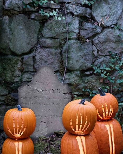 stacked pumpkins with hand and arm skeleton carvings in front of spooky cracked gravestone and old stone wall Pumpkin Carving Ideas Templates, Scary Halloween Decorations Outdoor Diy, Creative Pumpkin Decorating Ideas, Easy Pumpkin Carving Ideas, Halloween Pumpkin Decorations, Creative Pumpkin Decorating, Cute Pumpkin Carving, Scary Halloween Decorations Outdoor, Scary Halloween Decorations Diy