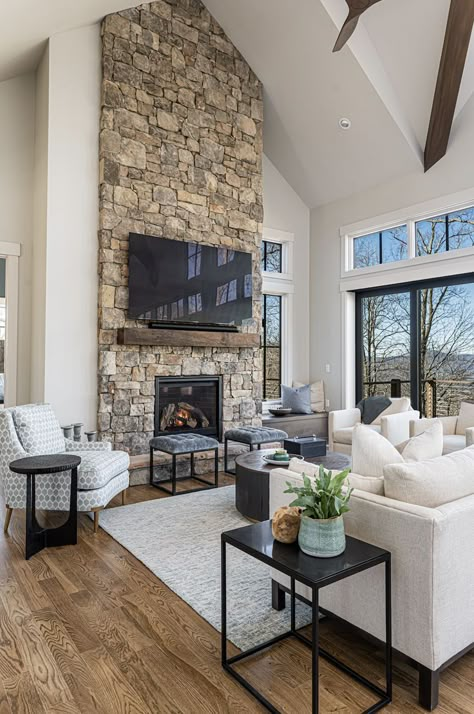 Central Stone Fireplace, Stone Fireplace Transitional, Stone On Fireplace Wall, Great Room With Stone Fireplace, Living Room Designs With Stone Fireplace, Tall Rock Fireplace Wall High Ceilings, Living Room Stone Fireplace Ideas, Neutral Living Room With Stone Fireplace, Great Room Stone Fireplace