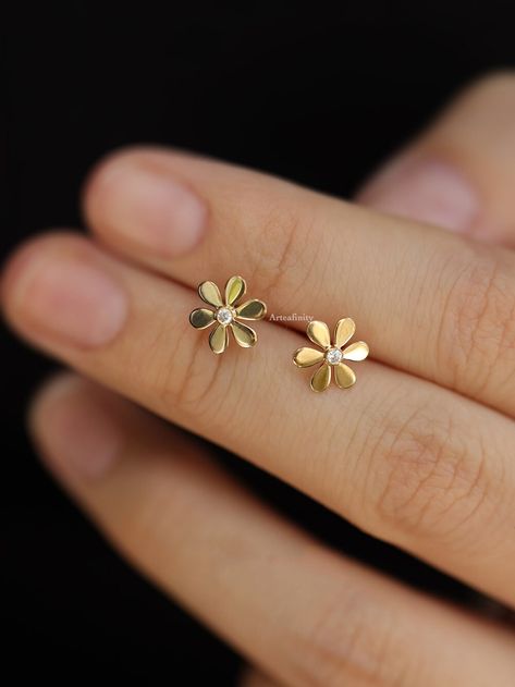 Tiny gold studs