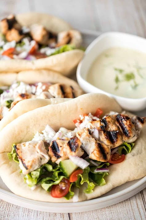 This refreshing and light, easy Greek chicken gyros is packed with tender souvlaki chicken, Greek salad, and homemade tzatziki sauce, all wrapped in a pita. | aheadofthyme.com Chicken Souvlaki Marinade, Souvlaki Chicken, Gyro Recipes, Greek Chicken Gyros, Chicken Greek, Greek Gyros, Chicken Pita, Chicken Souvlaki, Homemade Tzatziki