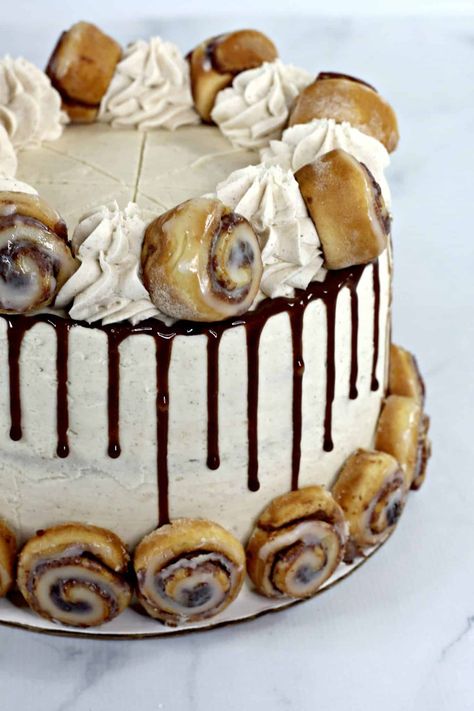 Layered Cinnamon Roll Cake Recipe - Sink your teeth into a slice of Cinnamon Roll Cake! This cinnamon roll layer cake is moist, delicious and topped with cinnamon icing. It\'s a must-try! #cinnamon #cake #layered #easy #simple #dessert #recipe #cinnamonroll #cinnamonicing #sweetpeaskitchen Cinnamon Rolls Cake, Cinnamon Roll Cake Recipe, Rolls Cake, Cinnamon Cake Recipes, Roll Cake Recipe, Caramel Apple Cheesecake Bars, Boxed Cake Mixes Recipes, Cake Recipes At Home, Cake Liner