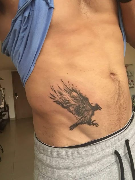 Waist Men Tattoo, Mens Raven Tattoo, Lower Abdomen Tattoo Men Ideas, Raven Tattoo Ideas For Men, Raven Tattoo Men, Stomach Tattoos Men, Pelvic Tattoos, Lower Belly Tattoos, Side Stomach Tattoos