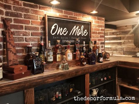 The Details of Our Basement Remodel — The Decor Formula Bar Remodel Ideas Basement, Basement Bar Sign Ideas, Basement Wall Ideas Decor, 60s Basement Remodel, Pub Wall Design, Basement Bar Wall Decor, Basement Bar Decor Ideas, Basement Bar Signs, Basement Bar Wall Ideas