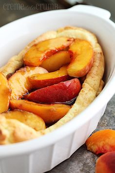 Peaches Cream Puff Pancakes Puff Pancake Recipe, Puff Pancakes, Peach Pancakes, Baby Recipe, Dutch Baby Recipe, Puff Pancake, Pancake Recipes, Peach Recipe, What's For Breakfast