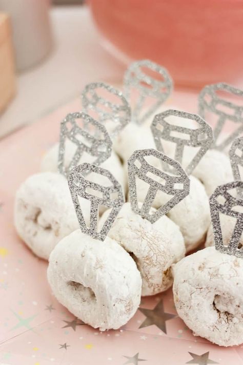 Cute donut rings! Beautiful Bridal Shower Decorations for the Modern Bride! Decorate with the Iridescent Martha Stewart Celebration Line, and personalize your party with the Cricut Explore 2! You're bride will be thrilled with the subtle glitter and glam in these pink and silver decorations! #cricutexplore #bridalshower #modernbride #woodaccents Cricut Projects For Bridal Showers, Simple Modern Bridal Shower Decor, Bridal Shower Ideas Donut, Pink And Silver Bridal Shower Ideas, Bridesmaid Party Decoration, Wedding Stuff Made With Cricut, Bridal Showers After The Wedding, Celebrating The Future Mr And Mrs, Cute Bridal Shower Decor