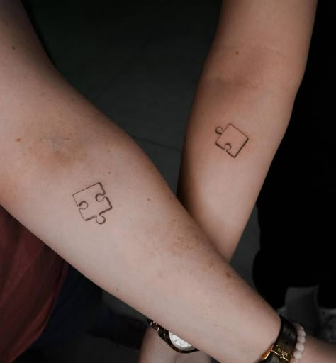 Minimalistic style matching puzzle piece tattooed on Puzzle Piece Tattoo Matching, Matching Puzzle Tattoo, Jigsaw Piece Tattoo, Puzzle Piece Matching Tattoos, Puzzle Tattoo Family, Puzzle Couple Tattoo, Puzzle Piece Tattoo Couples, Puzzle Piece Tattoo Best Friend, Puzzle Tattoo Design