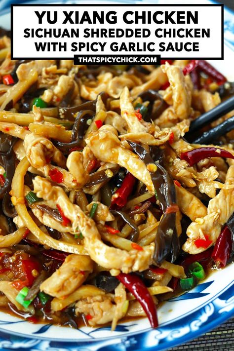 This Yu Xiang Chicken is a delicious Sichuan shredded chicken stir-fry in a hot and spicy garlic sauce. Tender shredded chicken, cloud ear mushrooms, bamboo shoots, plenty of garlic and chilies get tossed in a mouthwatering and addictive savory, sweet and tangy sauce! #yuxiangrousi #sichuanfood #stirfry #asianfood #chicken #dinner #spicy #garlicsauce #chinesefood | That Spicy Chick Chicken In Hot Garlic Sauce, Spicy Stir Fry Chicken, Shredded Chicken Sauce, Shaved Chicken Recipes, Chicken Stir Fry Recipes, Spicy Garlic Sauce, Hot Garlic Sauce, Garlic Sauce For Chicken, Szechuan Recipes