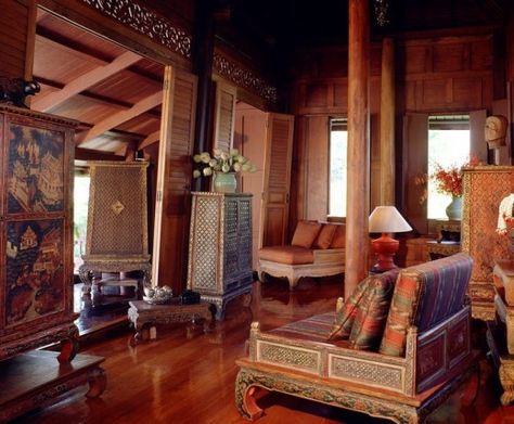 Traditional Thai house with old manuscript cabinet, table, and silk cushions in teak living room in Thailand, Southeast Asia, Asia : Stock Photo Thai Interior Design, Teak Living Room, Old Manuscript, Filipino House, Filipino Architecture, Thai Decor, Thai Architecture, Asian Interior Design, Philippine Houses