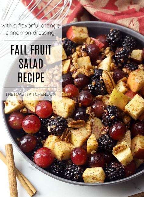 Fall fruit salad recipe by The Toasty Kitchen. This fall fruit salad is filled with fresh apples, blackberries, grapes, and pecans. Drizzled with a homemade cinnamon orange dressing that packs tons of fall flavor! #fall #fallfruitsalad #thanksgiving #halloween #apple #blackberry #grapes #cinnamondressing #nocooksidedish #sidedish #fallpicnic #homemade #cinnamon #orange #recipe Fruit Salad Cinnamon, Fall Fruit Salad With Orange Cinnamon Dressing, Fall Brunch Fruit Salad, Fruit Salad Brunch Ideas, Fall Breakfast Fruit Salad, Autumn Fruit Tray, Fall Fruit Side Dishes, Fall Salad Recipes Thanksgiving, Holiday Fruit Salad Thanksgiving