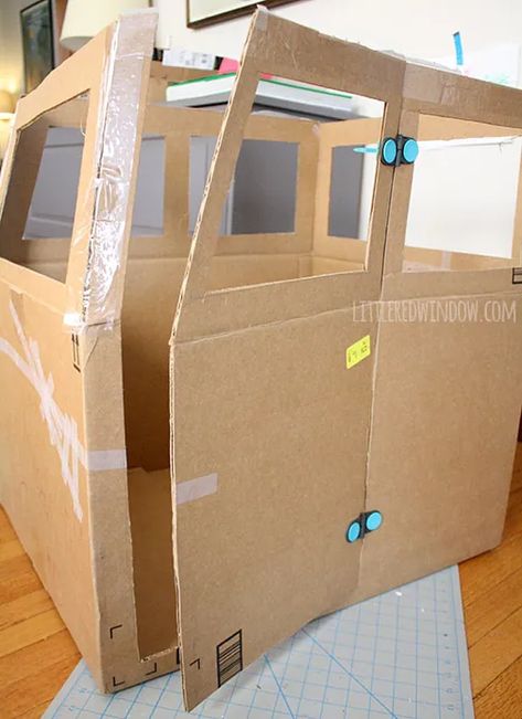 Making A Car Out Of Cardboard, Diy Cardboard Truck, Cardboard Bus, Golf Cart Decorations, Cardboard Box Car, Large Cardboard Boxes, Cardboard Cat House, Cardboard Car, Firetruck Birthday Party