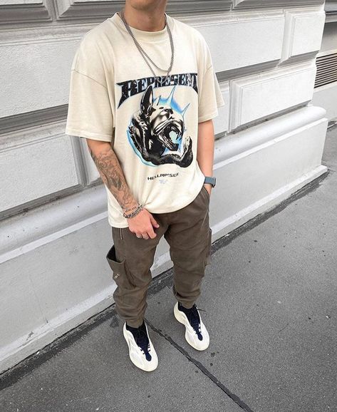 Graphic Tee And Cargo Pants Men, Yeezy Fits Men, Men Outfits Graphic Tees, Mens Tan Outfit, Graphic Tees Outfit Street Style Men, Tan Graphic Tee Outfit, Graphic Tee Fits Men, Yellow Tee Outfit, Yeezy Outfit Men