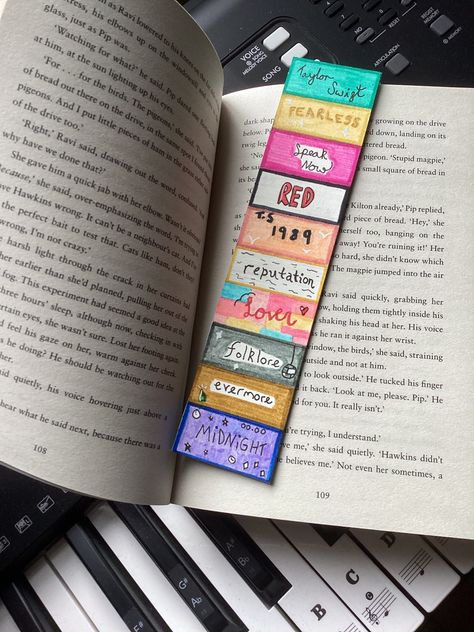 Taylor Swift Watercolor Bookmark, Taylor Swift Aesthetic Bookmark, Taylor Swift Junior Jewels Shirt Diy, Taylor Swift Album Bookmarks, Taylor Swift Cute Drawing, Presents For A Swiftie, Taylor Swift Book Mark Diy, Bookmark Ideas Taylor Swift, Swiftie Present Ideas