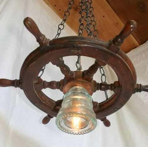 Using Ship Wheels for the Perfect Touch in your Beach House - Beach Bliss Living Ship Wheel Decor, Nautical Chandelier, Nautical Bathroom Design Ideas, Pirate Bar, Boat Furniture, Nautical Ideas, Ships Wheel, Beach Lighting, Nautical Lighting