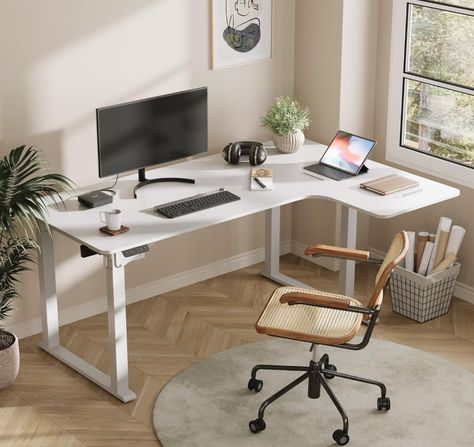 The sleek and minimalist design of the desk adds a touch of elegance to any workspace. The clean lines and smooth surface create a modern and professional atmosphere, while the spacious desktop provides ample room for all your work essentials. #wfh #homeofficeessentials #homeoffice #rising desk L Shaped Standing Desk, Innovative Office, Height Adjustable Desk, Home Office Table, Corner Computer Desk, Ergonomic Desk, Electric Standing Desk, Adjustable Height Standing Desk, Stand Up Desk