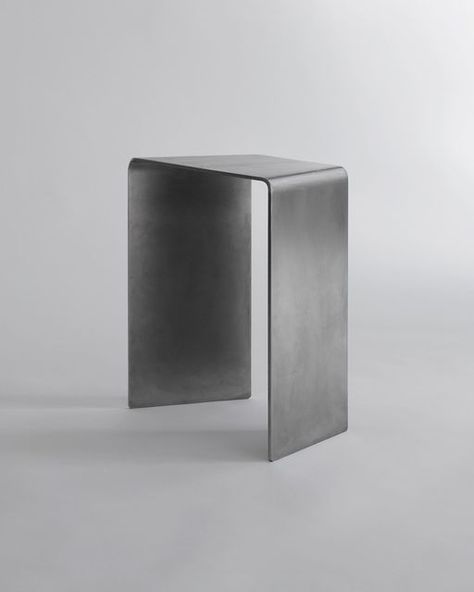 PerCapita® on Instagram: "‘Fettuccine' Now available in our online store - link in bio. Fettuccine is a modular object designed to be used as a side table, stool, or display surface. Handcrafted seamlessly out of high-grade stainless steel, its form, materiality and unique geometry are engineered to give it a sleek and streamlined appearance while providing stability and grounding. Gently filleted edges and hand-finished surfacing ensure a soft interface, juxtaposing the hardness of steel. St Stainless Steel Stool, Black Leather Aesthetic, Puff Stool, Aesthetic Side Table, Stainless Furniture, Steel Objects, Metal Side Tables, Stainless Steel Side Table, Stainless Table