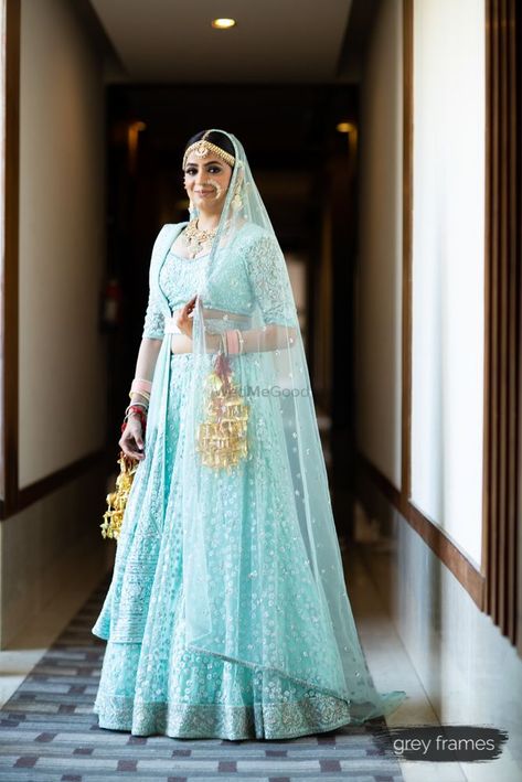 Aqua blue bridal lehenga for wedding. See more on wedmegood.com  #wedmegood #indianwedding #indianbride #bridallehenga #lehenga #lehengacholi #kaleere #weddingdress Indian Bridal Lehenga Blue, Light Blue Lehenga, Blue Bridal Lehenga, Bollywood Brides, Lehenga Blue, Indian Bridal Lehenga, Half Sarees, Blue Lehenga, Bridal Lehenga Red