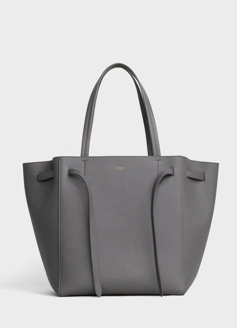 Small Cabas Phantom in soft grained calfskinOfficial website | CELINE Celine Cabas, Celine Logo, Bag Illustration, Aging Beautifully, Celine Bags, Leather Logo, Leather Belts, Leather Handle, Luxury Handbags