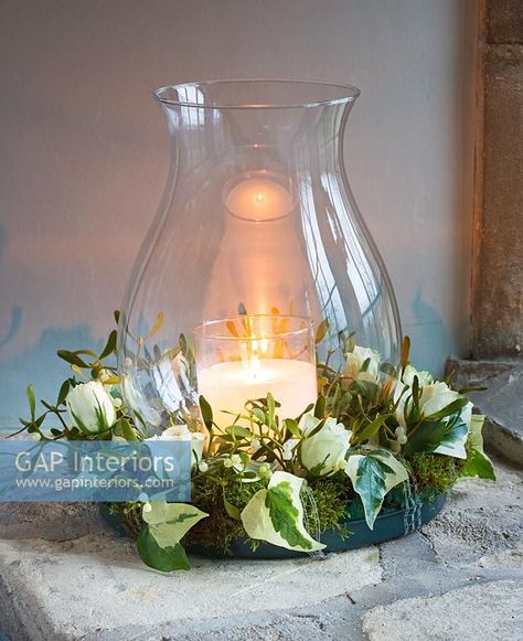 Wreath of Ivy, Roses and Mistletoe around jar with candle Holly And Ivy, Candle Images, Christmas Decor Inspiration, Interior Photography, Home Interior, Festival Season, Decorating Your Home, Decor Inspiration, Bouquets