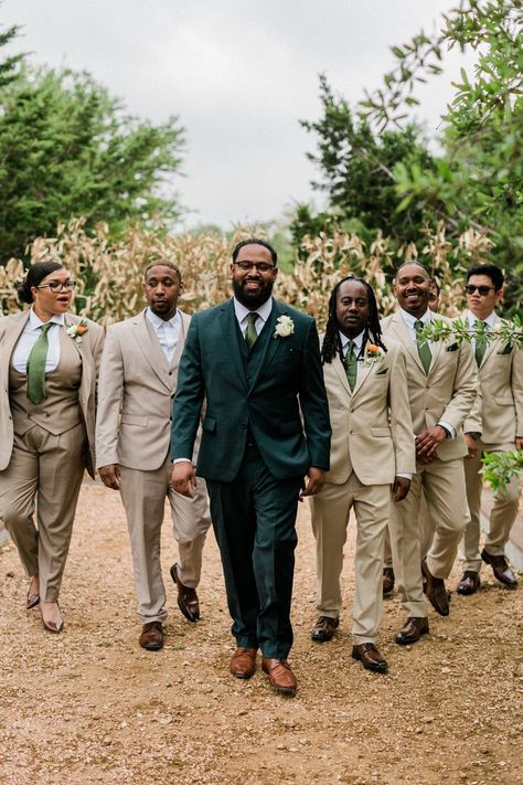 Green Groom Tan Groomsmen, Green And Tan Suit Wedding, Dark Beige Groomsmen Suits, Rust And Green Groomsmen, Green And Cream Wedding Suits, Groom Hunter Green Suit, Khaki Suit Green Tie, Tan Suit Green Shirt, Khaki Green Suit