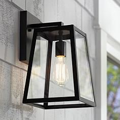 Add light and brightness to your home's exterior with this Mystic black finish outdoor wall light. Farmhouse Outdoor Lighting, Outdoor Wall Light Fixtures, Modern Outdoor Wall Lighting, Exterior Light Fixtures, Black Light Fixture, Black Outdoor Wall Lights, Exterior Wall Light, Garage Lighting, House With Porch