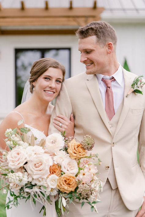 Luxurious Terracotta and Blush Modern Boho Wedding Peach Wedding Suit Men, Light Colored Groom Suit, Groom In Beige Suit, Light Tan Tux Wedding, Tan Suit Pink Tie, Peach Wedding Groomsmen, Peach Groomsmen Attire, Spring Wedding Suits For Men, Blush Groomsmen Attire