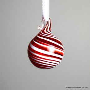 miniature red swirl blown glass ornament. Incredibly tiny at just about 5/8" diameter. These would compliment the smallest of table trees. The artist offers enough variety to fill an entire table tree. Small Christmas Decorations, Ornament Hangers, Art Glass Ornaments, Table Tree, Red Christmas Ornaments, Groovy Christmas, Light Bulb Ornaments, Farmhouse Ornaments, Red And White Christmas