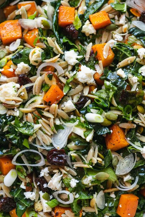 This hearty, beautiful, Fall Orzo Salad showcases all the best parts of autumn! We've got whole wheat orzo, maple roasted butternut squash, hearty kale, feta, dried cherries, toasted almonds and pepitas, parsley, shallots, scallions, and a maple dijon apple cider vinaigrette. It's filled with loads of texture and flavor, and the best part is, it can be made ahead of time, making it the perfect addition to any holiday table or prep-ahead lunch! #fallsalad #orzo #salad #holiday #vegetarian Butternut Squash Toast, Maple Butternut Squash, Kale Feta, Fall Lunch, Apple Cider Vinaigrette, Orzo Salad Recipes, Cider Vinaigrette, Holiday Salads, Dijon Vinaigrette