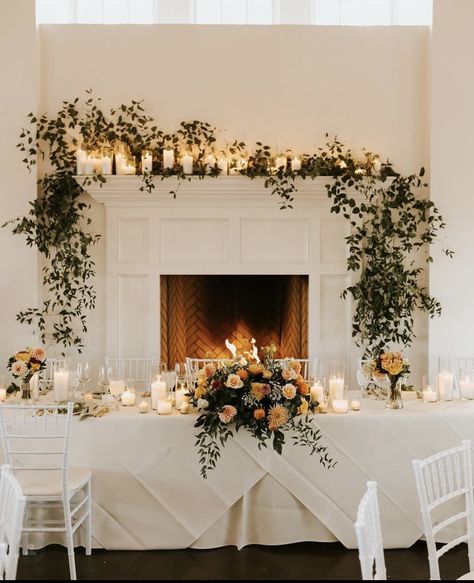 Floral Fireplace Wedding, Wedding Fireplace Candles, Sweetheart Table Wedding With Fireplace, Candle Mantle Decor Wedding, Fireplace Wedding Reception, Fireplace Mantle Decor For Wedding, Mantle Greenery Wedding, Fireplace Greenery Wedding, Wedding Decor Fireplace