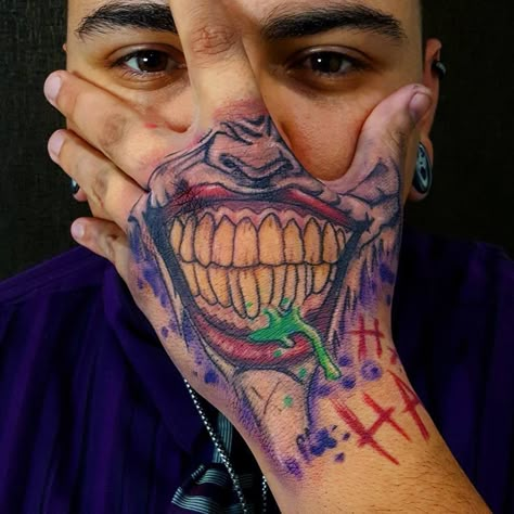 #Joker #handtattoo by Eddie Vazquez @eddievtattoos Side Burn Tattoos Men, Joker Mouth Tattoo, Joker Smile Hand Tattoo, Face Hand Tattoo, Joker Hand Tattoo, Joker Smile Tattoo, Tato Joker, Joker Hand, Tatuaje Trash Polka